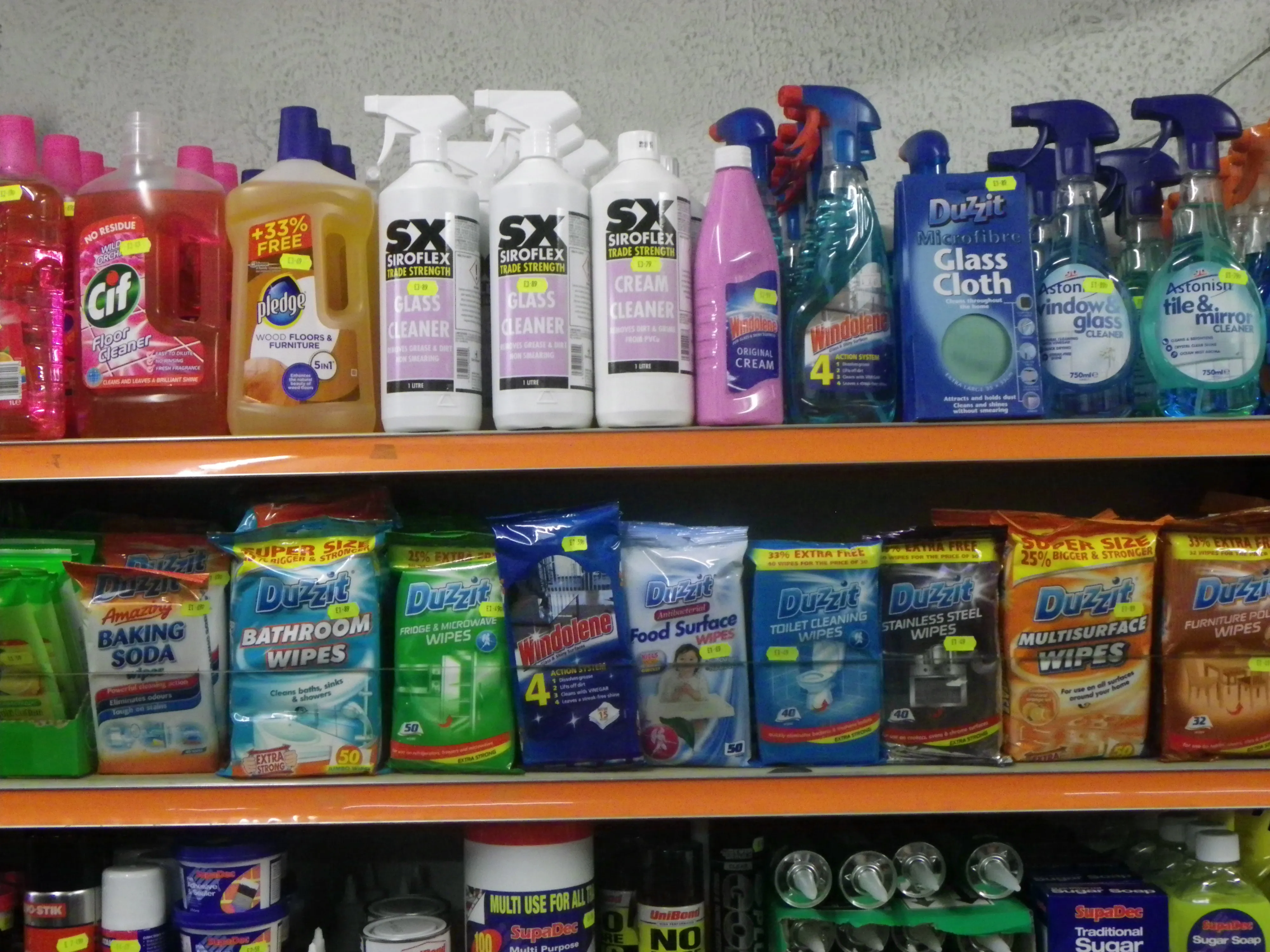 Cleaning shelves in the shop