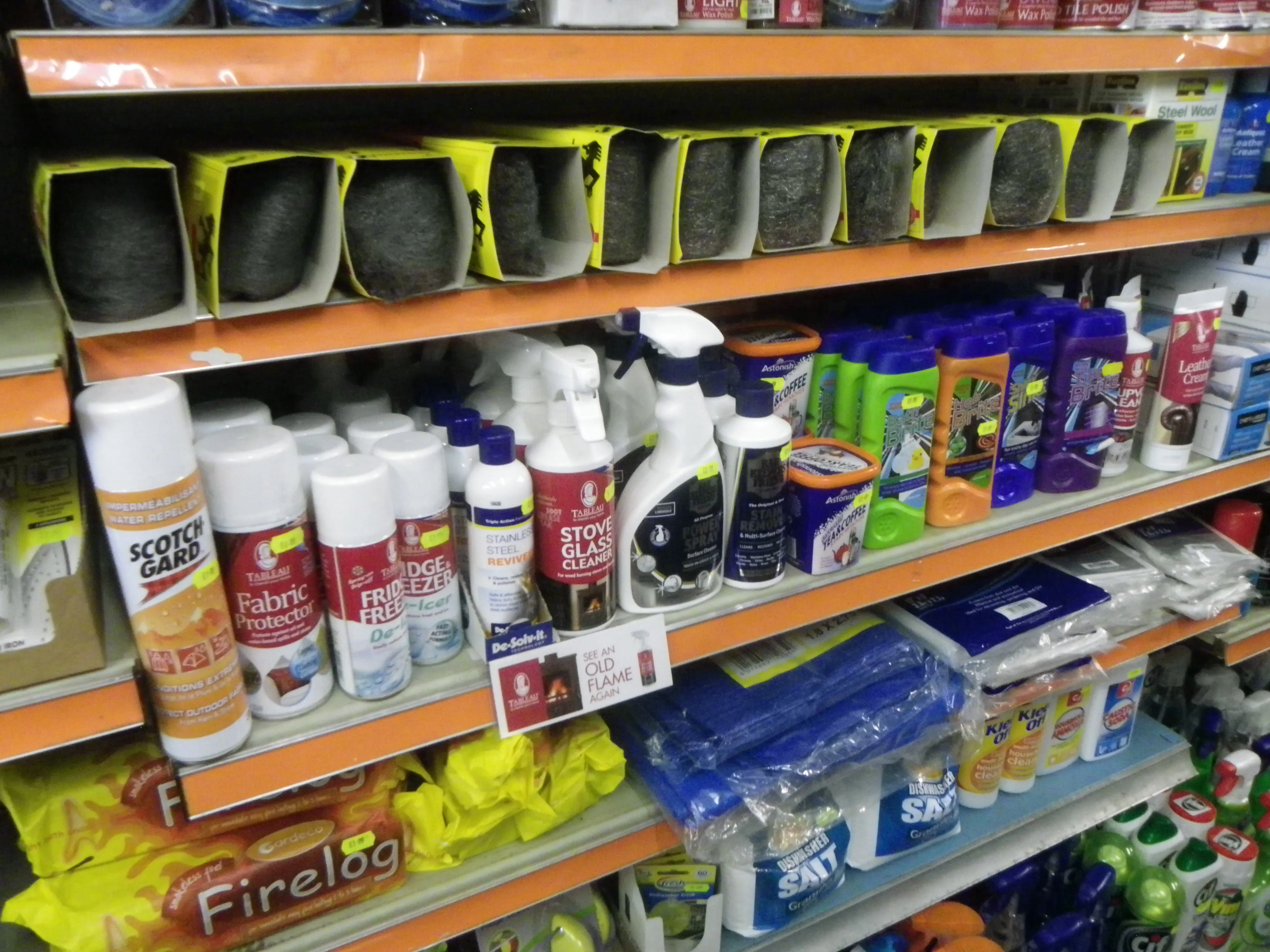 Cleaning shelves in the shop