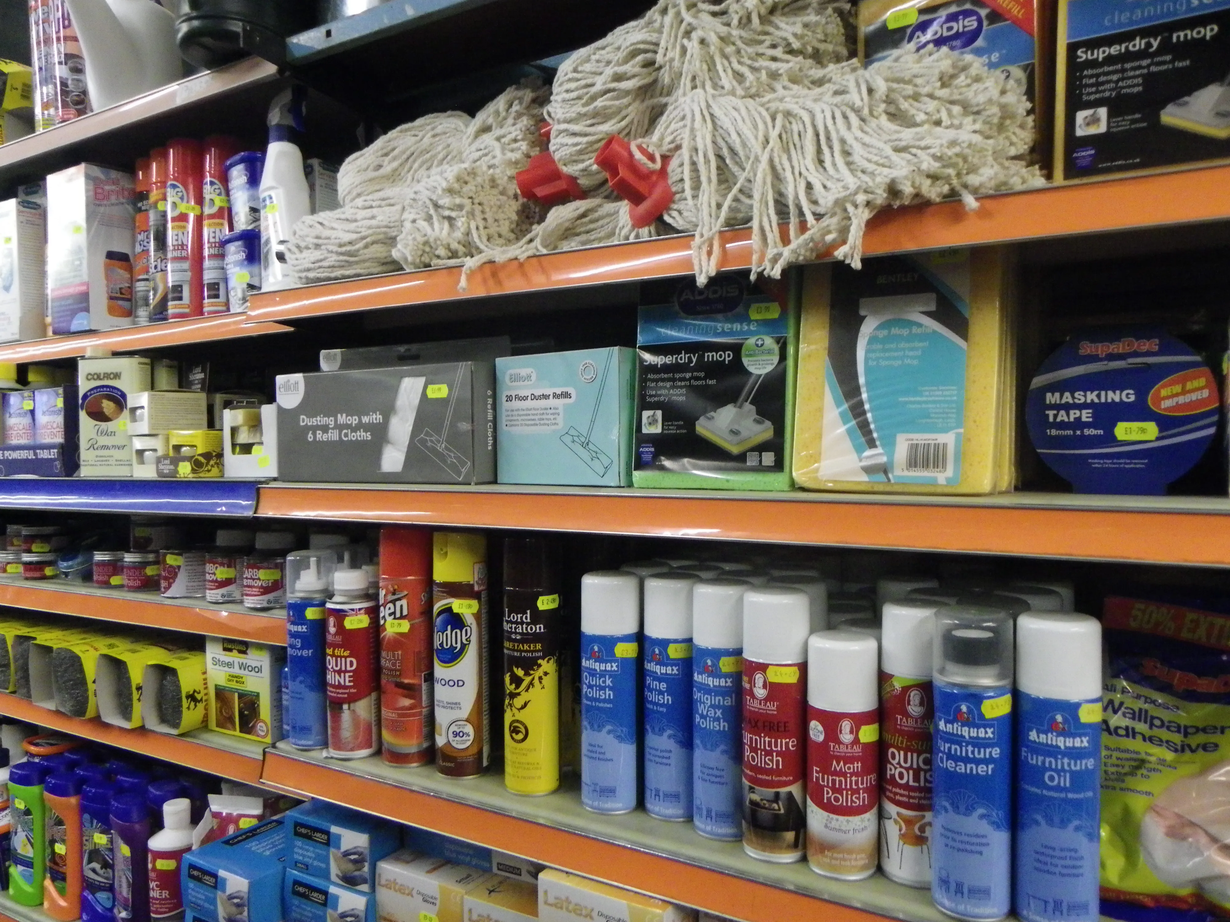 Cleaning shelves in the shop